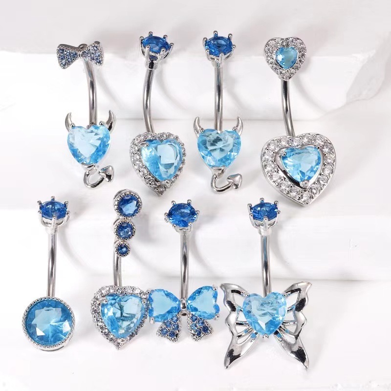 Navel rings with teardrop - shaped cubic zirconia and diamond - like rhinestone inlays. Stainless steel all - match navel studs, body piercing jewelry.