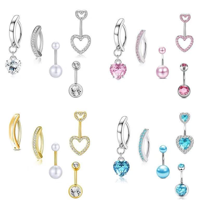 Navel rings with teardrop - shaped cubic zirconia and diamond - like rhinestone inlays. Stainless steel all - match navel studs, body piercing jewelry.