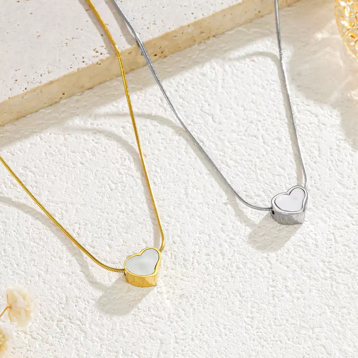 French-Style Titanium Steel Necklace with a Golden Pendant of White Mother-of-Pearl Heart