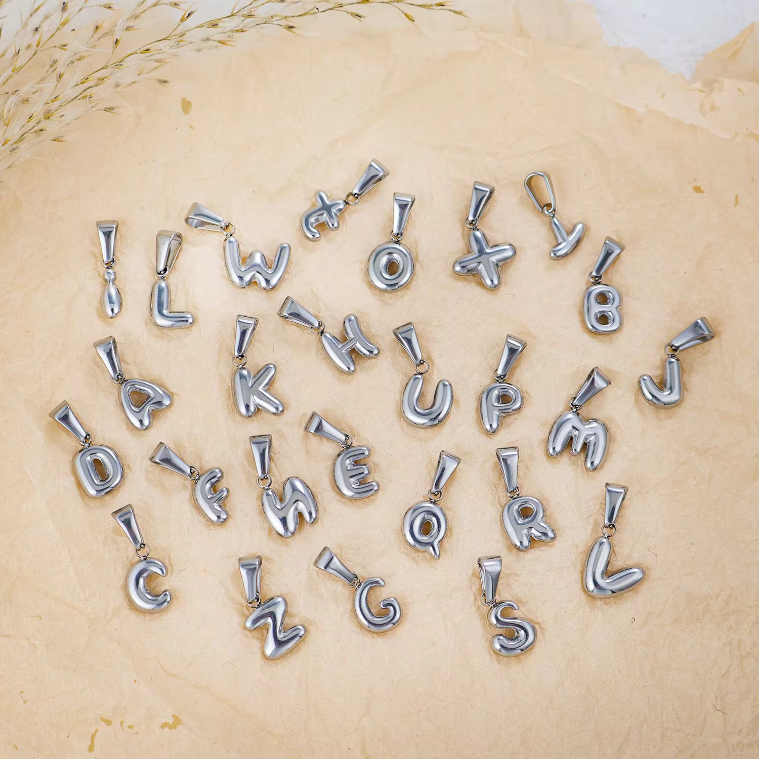 Stainless steel pendant letters.