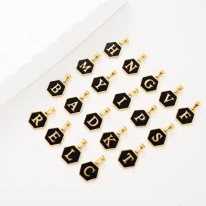 Stainless steel pendant plated with 18K gold in the shape of letters.