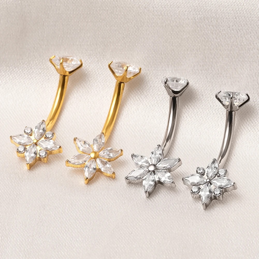 Navel rings with teardrop - shaped cubic zirconia and diamond - like rhinestone inlays. Stainless steel all - match navel studs, body piercing jewelry.