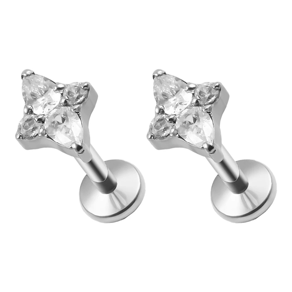 G23 titanium piercing jewelry inlaid with cubic zirconias, including internally threaded and internally toothed ear studs, lip studs, nose studs, and helix ear studs.
