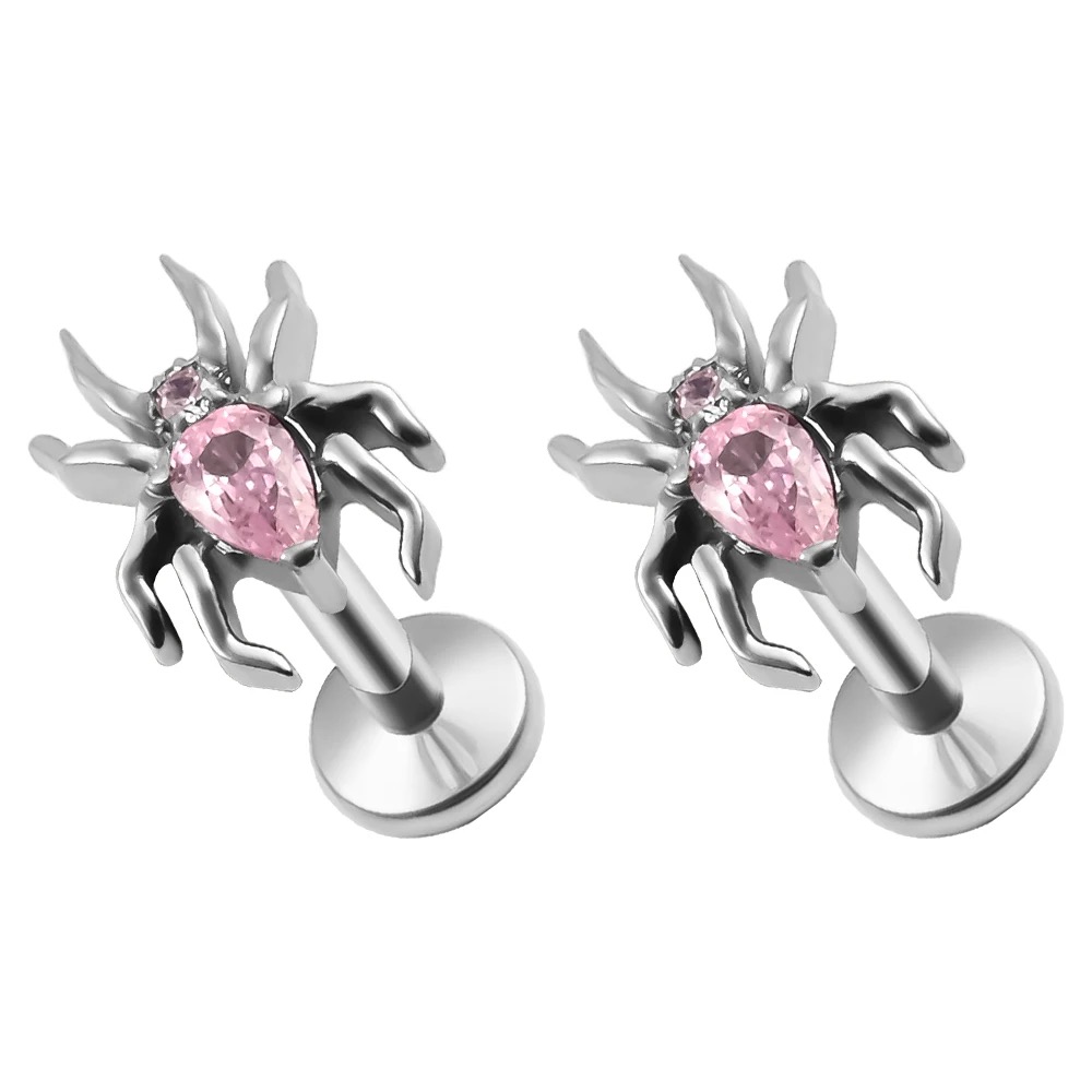 G23 titanium piercing jewelry inlaid with cubic zirconias, including internally threaded and internally toothed ear studs, lip studs, nose studs, and helix ear studs.
